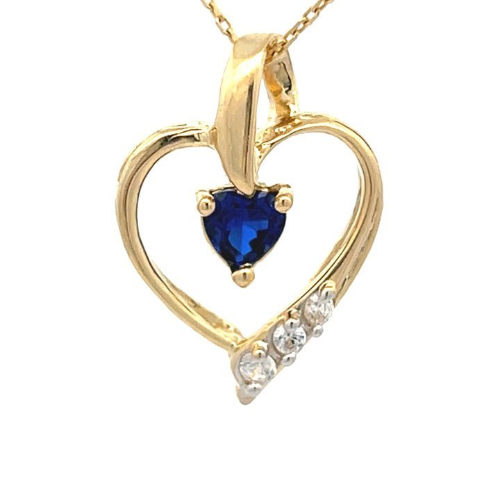 Corazon con piedra azul Oro 14k